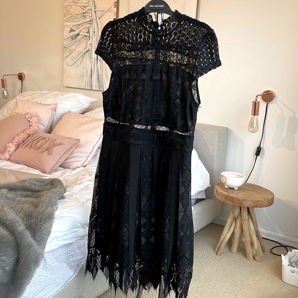 Foxiedox black cocktail dress.